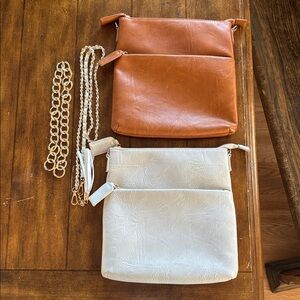 2 Ahdorned cross body purses with two off brand straps 
New condition.